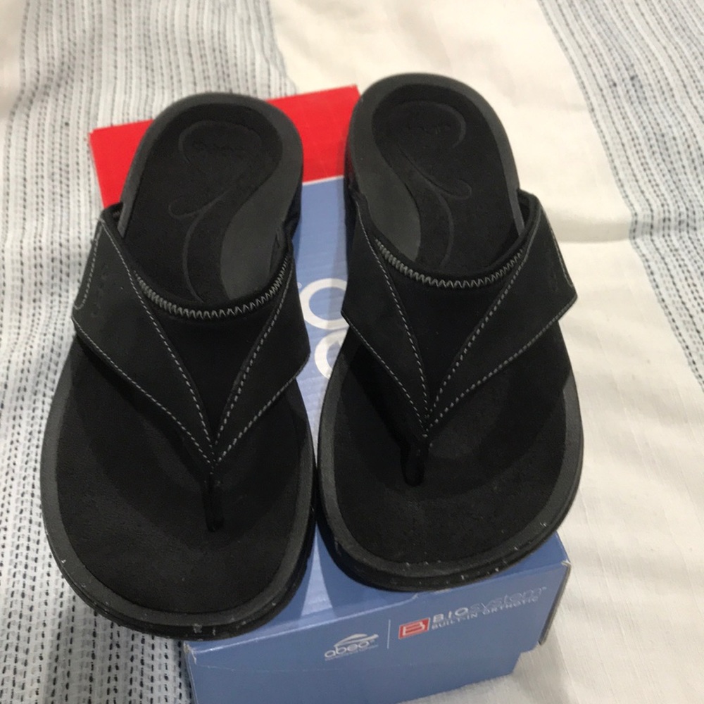 Black flip flops